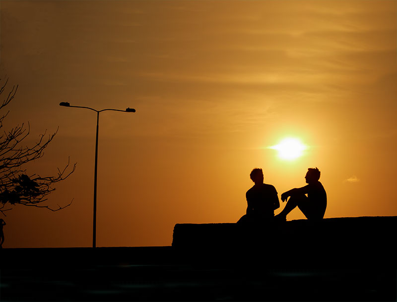 Watch the sunset on top of the Old City wall in Cartagena